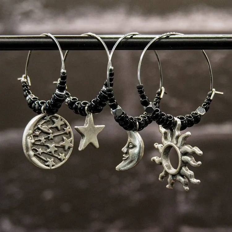 kolczyki koła celestial whimsical boheme noir moon stars sun.webp